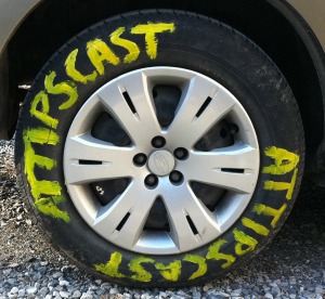 The word "A.T.TIPSCAST" painted on a tire